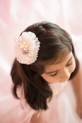 Off-white circular hair accessory